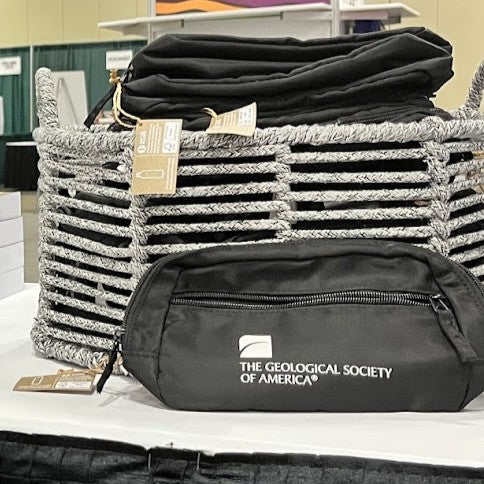 Black bag with 'The Geological Society of America' logo on a woven basket background
