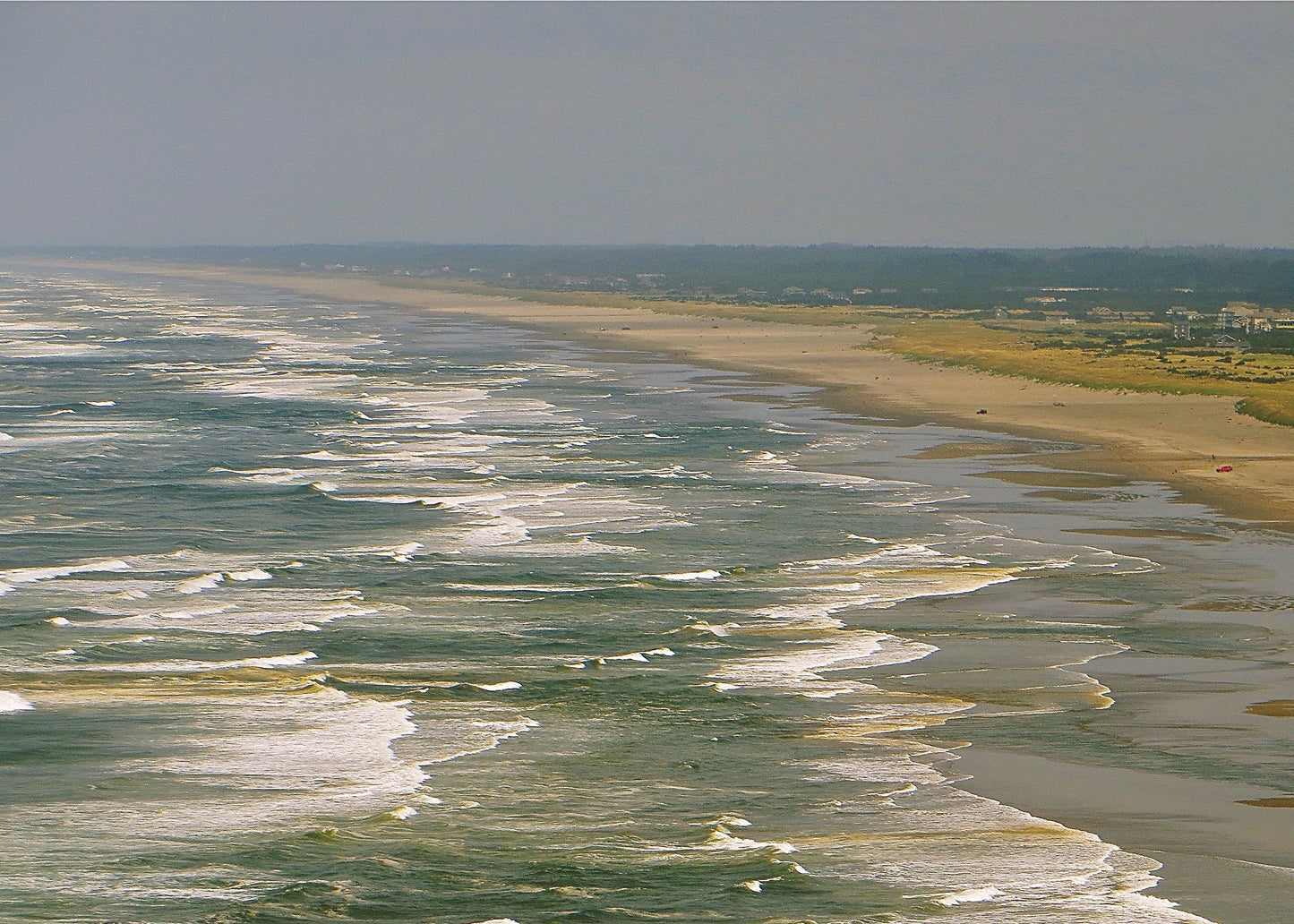 Coastal landscape with waves meeting a sandy beach, Long Beach, Washington
