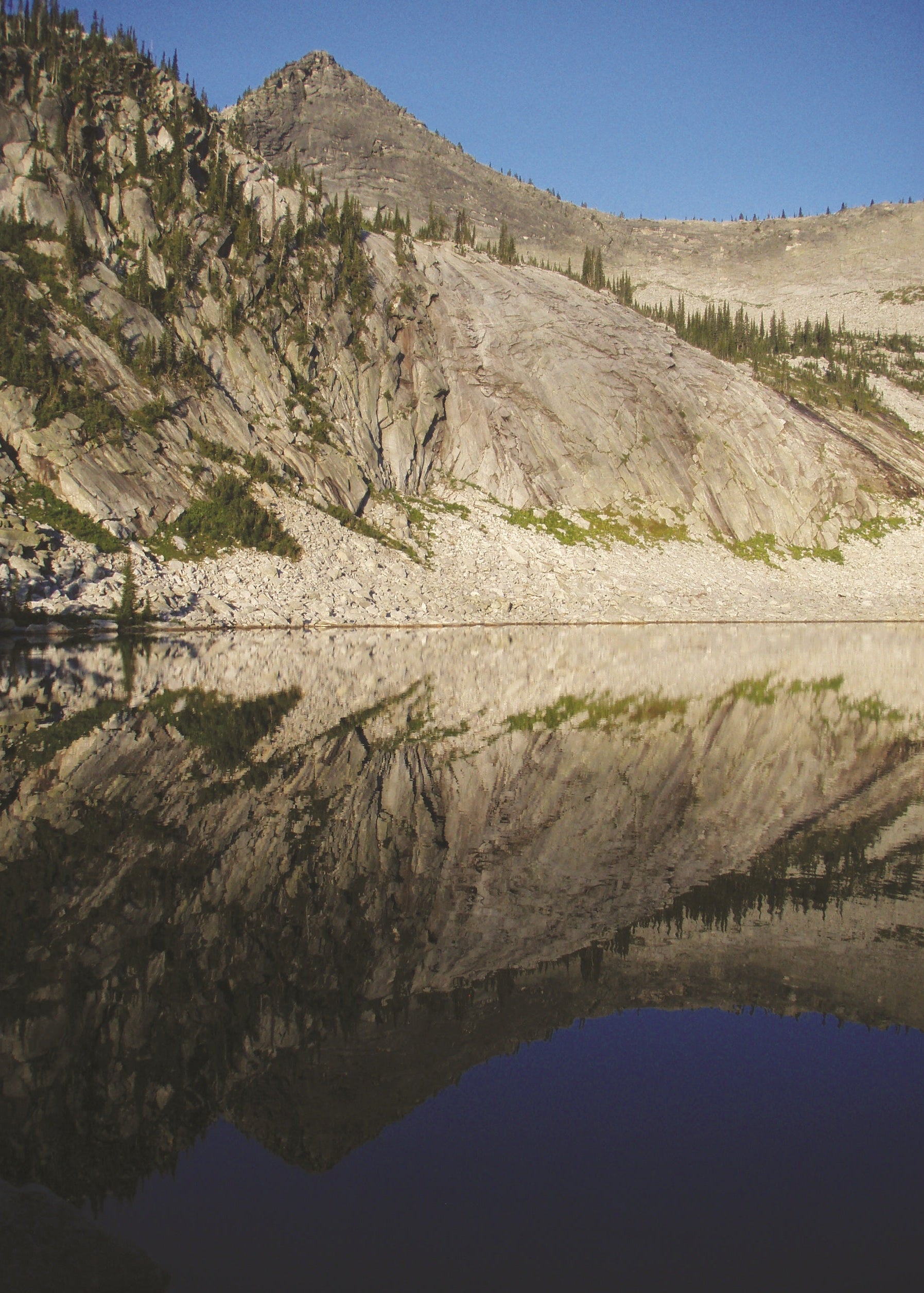 Mountain reflection in a lake with clear blue sky, Idaho
