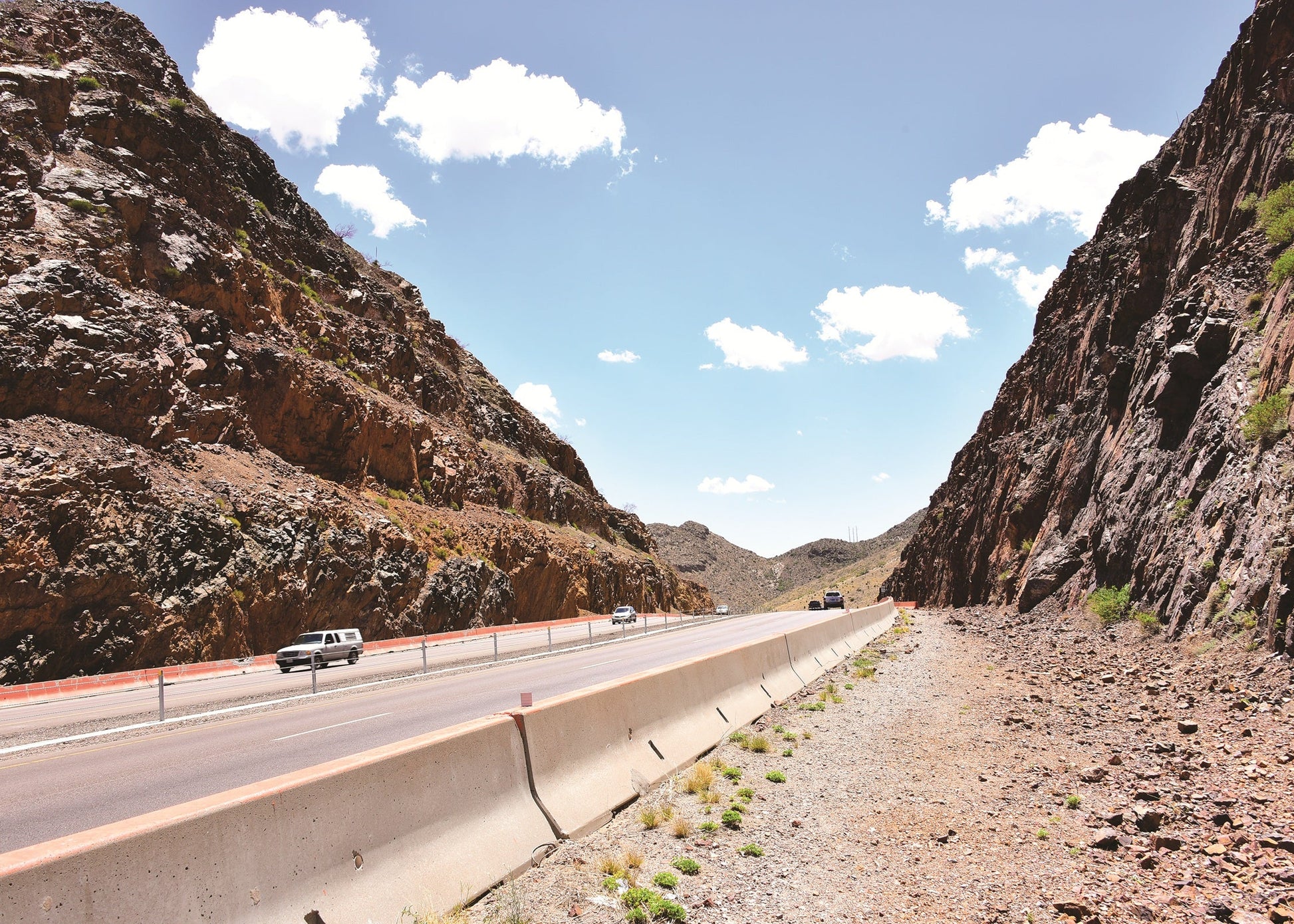 At Smugglers Pass, Transmountain Drive cuts through cliffs of Thunderbird Group rhyolite. Texas, USA