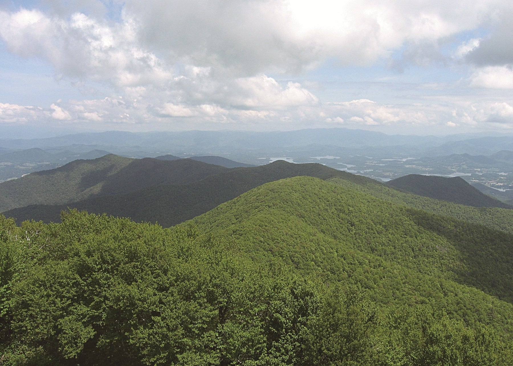 Scenic view of green mountains under a cloudy sky, Georgia