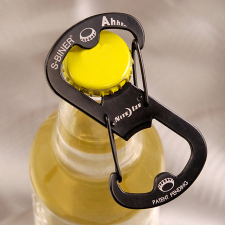 Bottle opener with caribiner