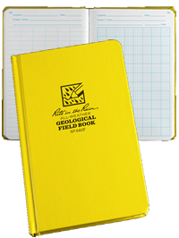 Yellow geological field book with grid lines on its pages